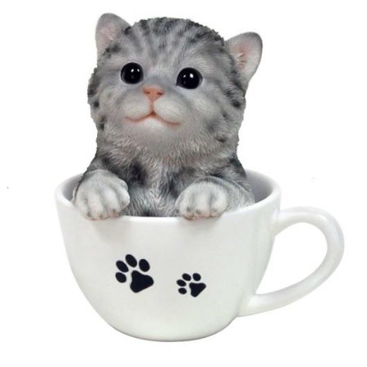 愛らしい猫の置物 ティーカップ猫 気持ちよさそうティーカップで