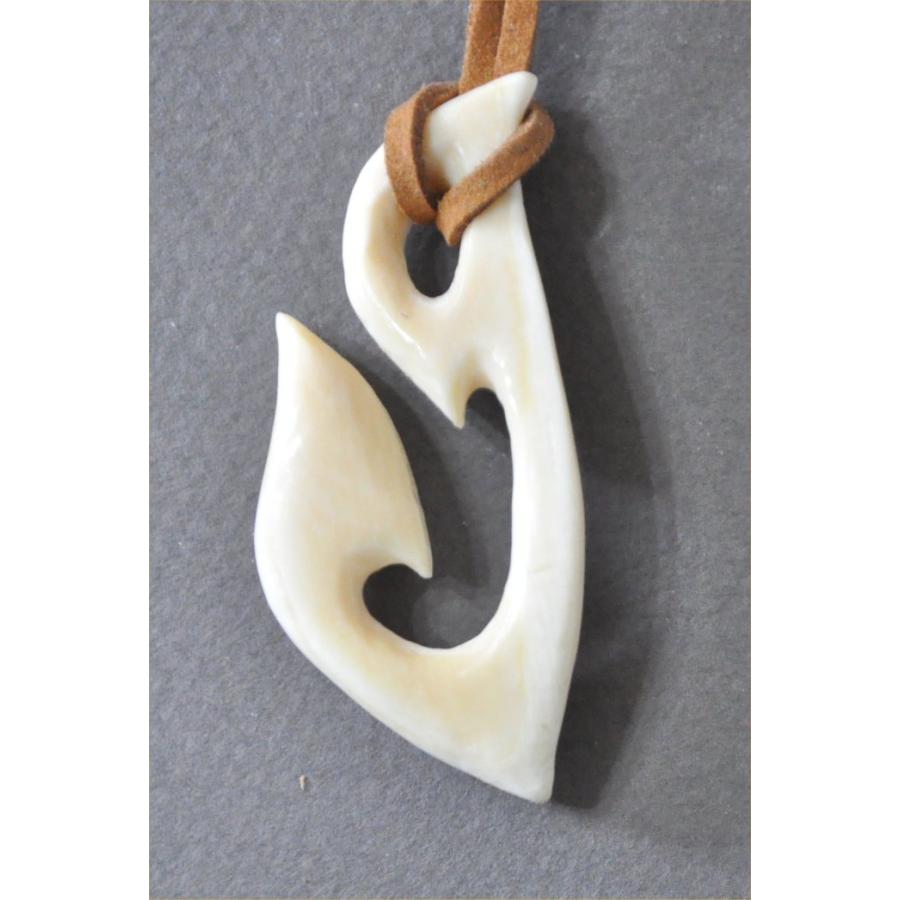 マッコウクジラの歯のフィッシャーホークデザインのペンダントヘッド |  | 01