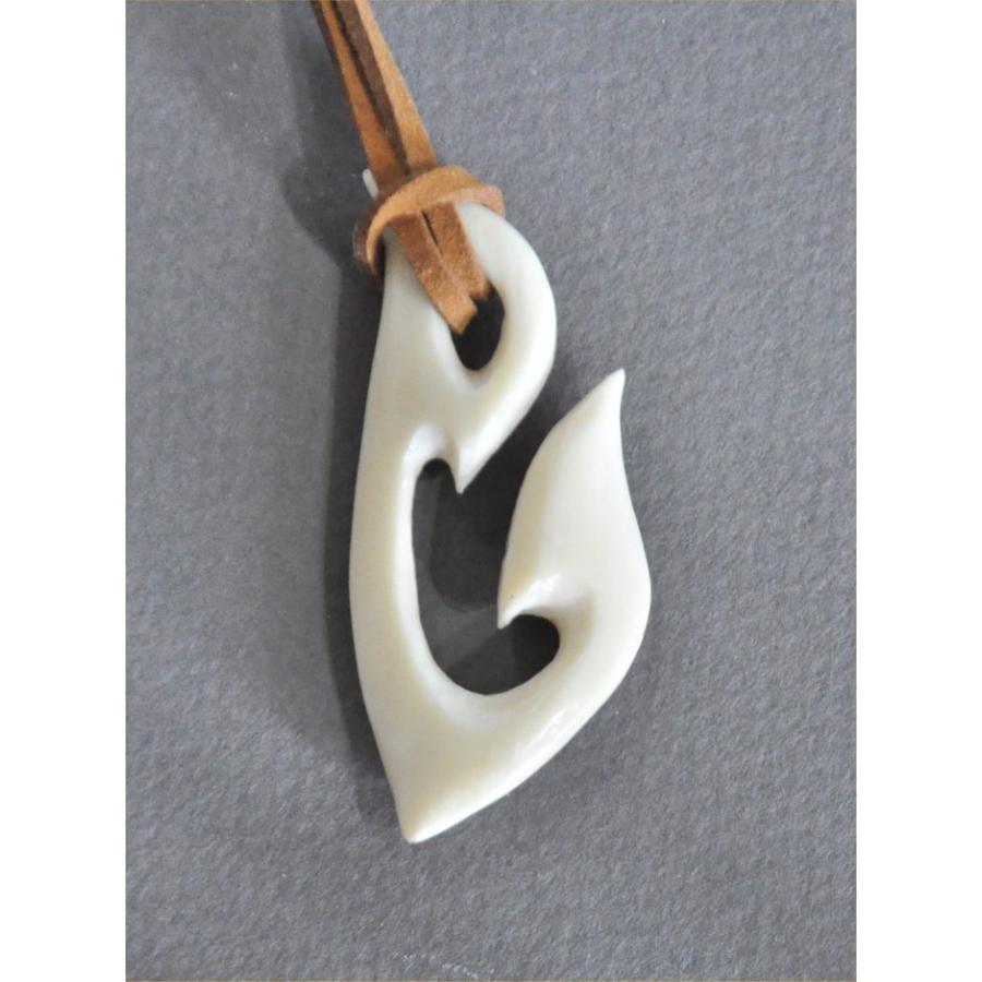 マッコウクジラの歯のフィッシャーホークデザインのペンダントヘッド |  | 04