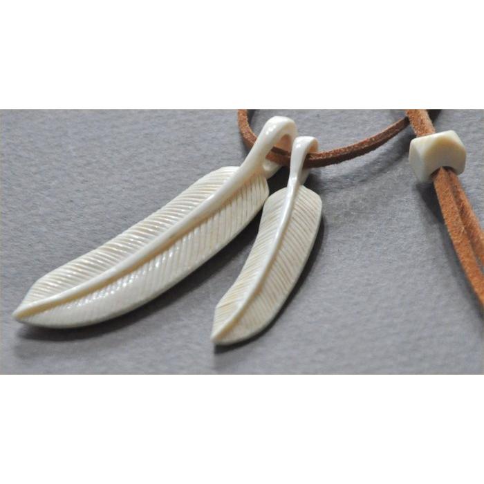 マンモス牙のフェザー大小2個のペンダントヘッド |  | 01