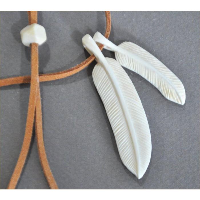 マンモス牙のフェザー大小2個のペンダントヘッド |  | 02