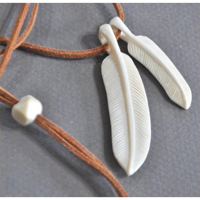 マンモス牙のフェザー大小2個のペンダントヘッド |  | 04