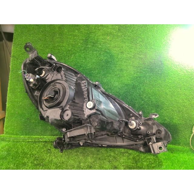 フィット DBA-GE6 左ヘッドランプASSY G 10THアニバーサリー L13A NH624P 33150-TF0-J51の画像
