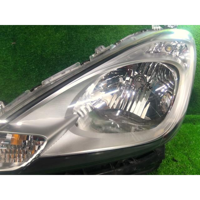 フィット DBA-GE6 左ヘッドランプASSY G 10THアニバーサリー L13A NH624P 33150-TF0-J51の画像