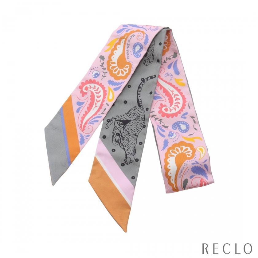 エルメス HERMES ツイリー GUEPARDS BANDANA スカーフ 衣料品 シルク シルク レディース ピンク系 / グレー系 / マルチカラー 【中古】 HERMES（エルメス） ツイリー GUEPARDS BANDANA リボン スカーフ