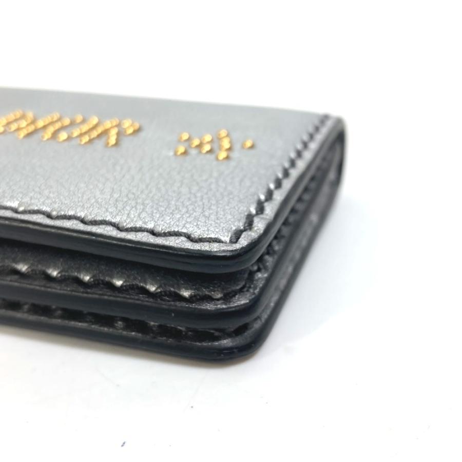 Dior ディオール パスケース 名刺入れ J’ADIOR  スタッズ キーホルダー バッグチャーム 2つ折り カードケース レザー シルバー【中古】 |  | 06