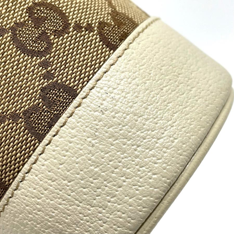 GUCCI ボトルケース Gucci Savoy rigid bottle case in beige and ebony GG Supreme