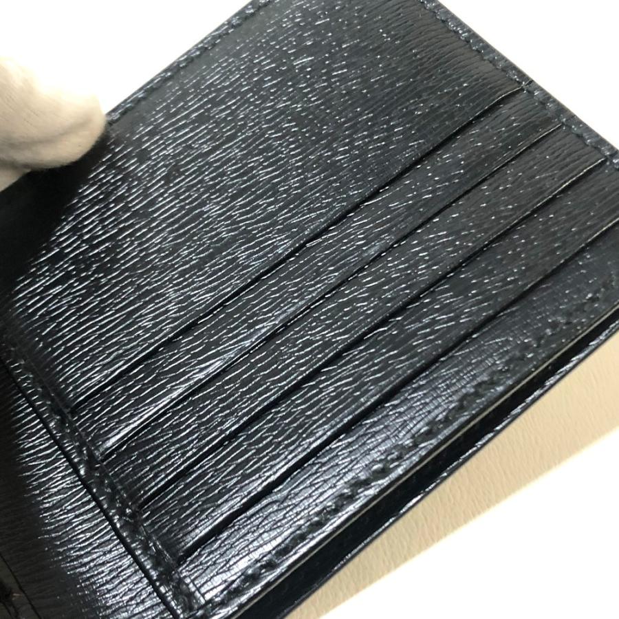 Gucci グッチ キングスネークプリント 蛇モチーフ 二つ折り財布 小銭入れなし ブラック ブラック レッド メンズ 新品同様 中古 O 0908 13 リファレンス コレクション 通販 Yahoo ショッピング