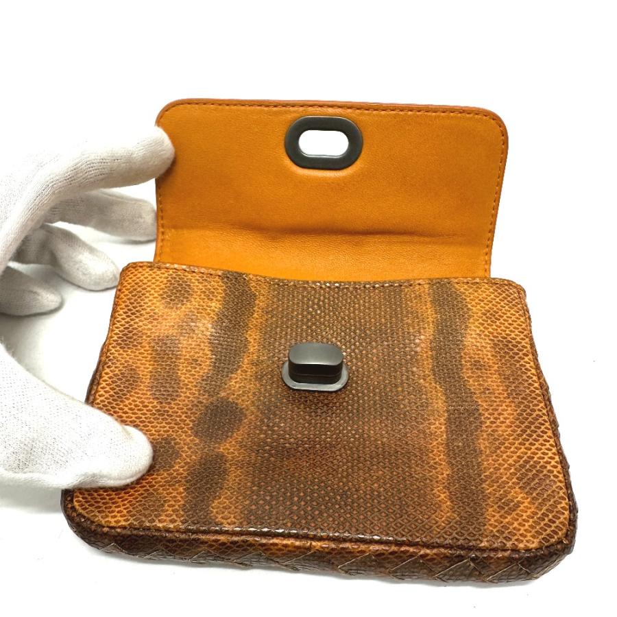 BOTTEGA VENETA ボッテガヴェネタ 型押し ターンロック 小物入れ 収納ポーチ ミニ ポーチ オレンジ レディース【中古】 |  | 05