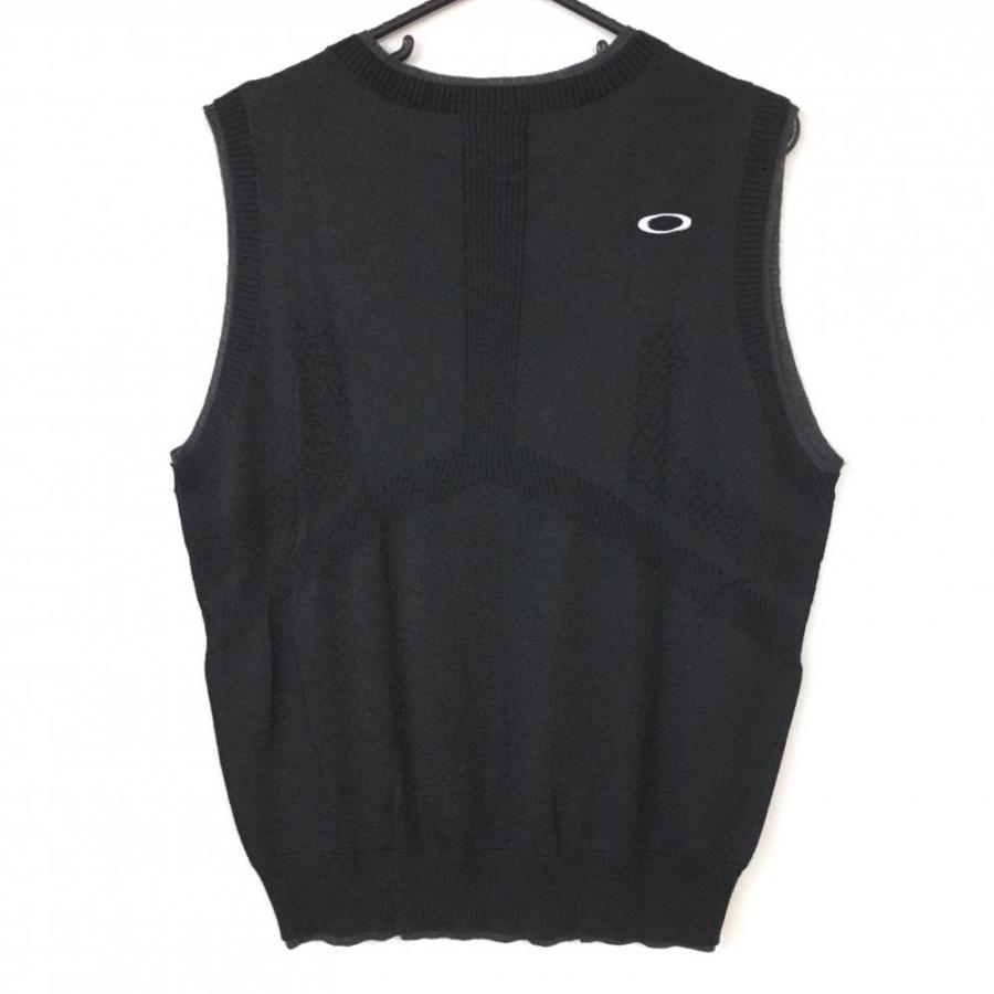 美品】Oakley オークリー ニットベスト 黒×白 前面柄 Vネック 美品】Oakley オークリー ニットベスト 黒×白 前面柄 Vネック