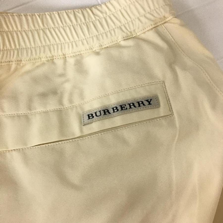 BURBERRY バーバリーゴルフ ナイロンパンツ クリーム色 裏 BURBERRY バーバリーゴルフ ナイロンパンツ クリーム色 裏