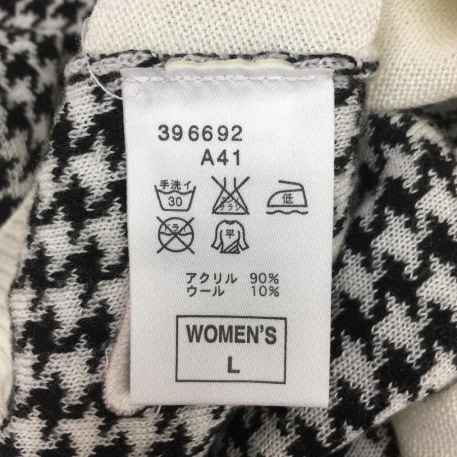 NIKE ナイキゴルフ 長袖ニットセーター 白×黒 前面千鳥格子柄 NIKE ナイキゴルフ 長袖ニットセーター 白×黒 前面千鳥格子柄