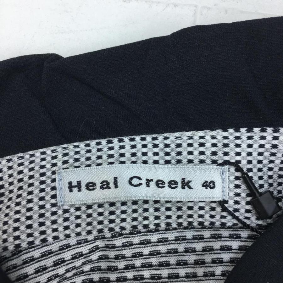 Heal Creek（ヒールクリーク） 半袖ハイネックシャツ 黒×白 総柄
