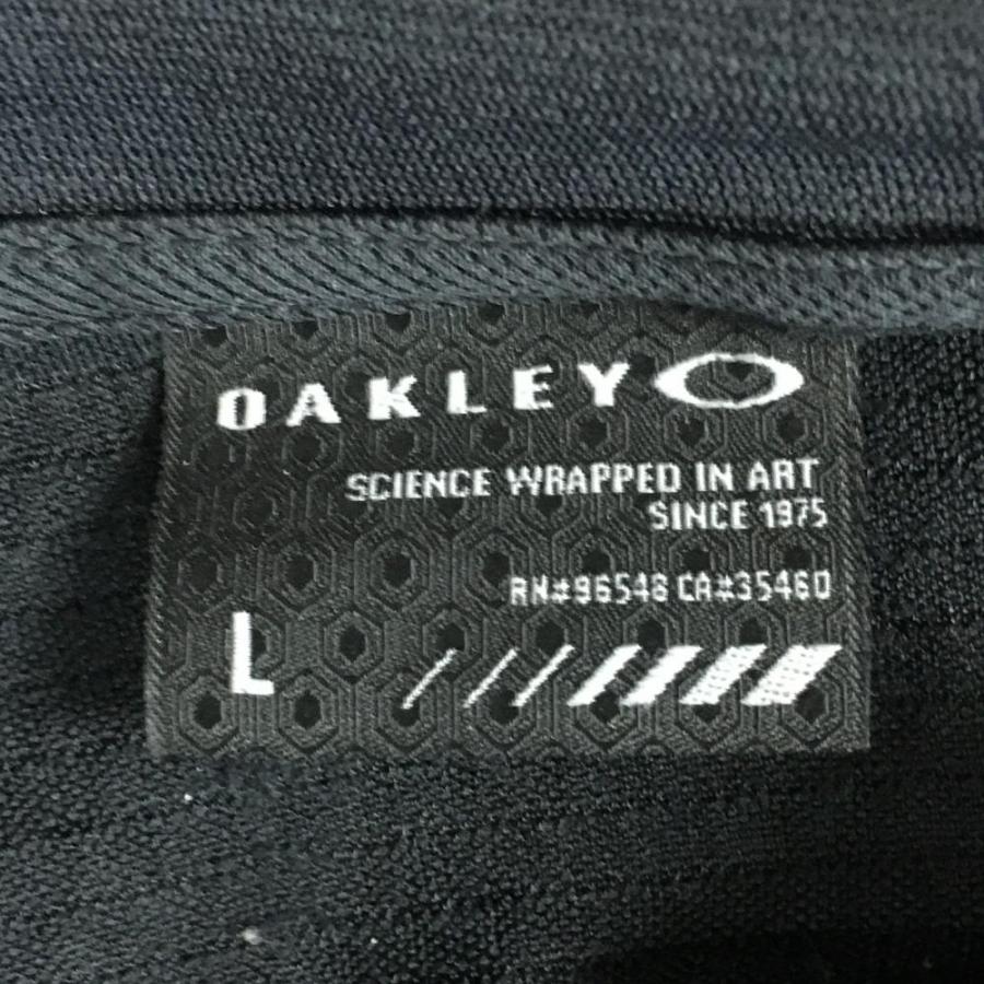 50%OFF価格／Oakley オークリー ジップパーカー 黒×ゴールド 背面一部