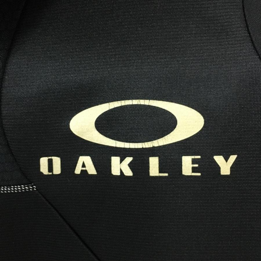 50%OFF価格／Oakley オークリー ジップパーカー 黒×ゴールド