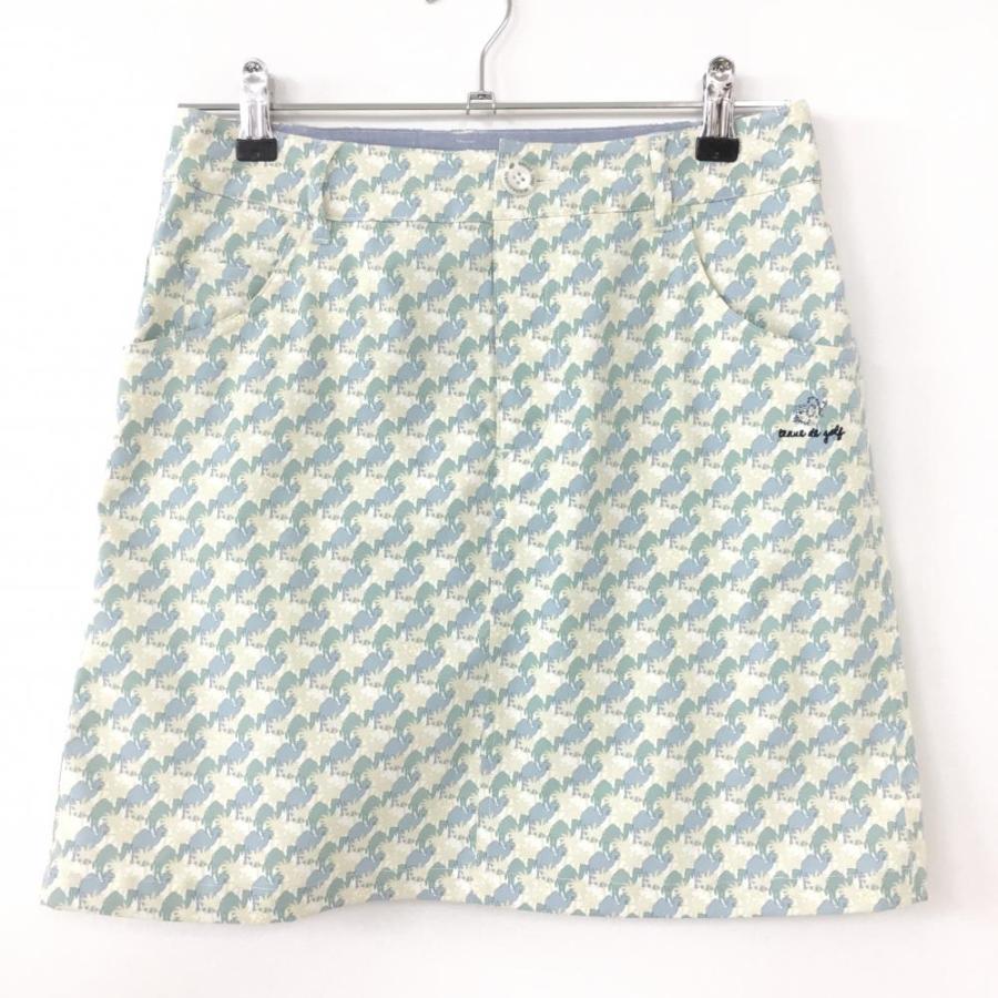 ZOY（ゾーイ） スカート ライトブルー×白 ラクダ柄×ヤシの木