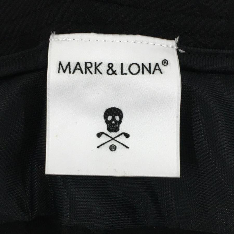 MARK&LONA（マークアンドロナ） ストレッチパンツ 黒 ロゴ×スカル総柄