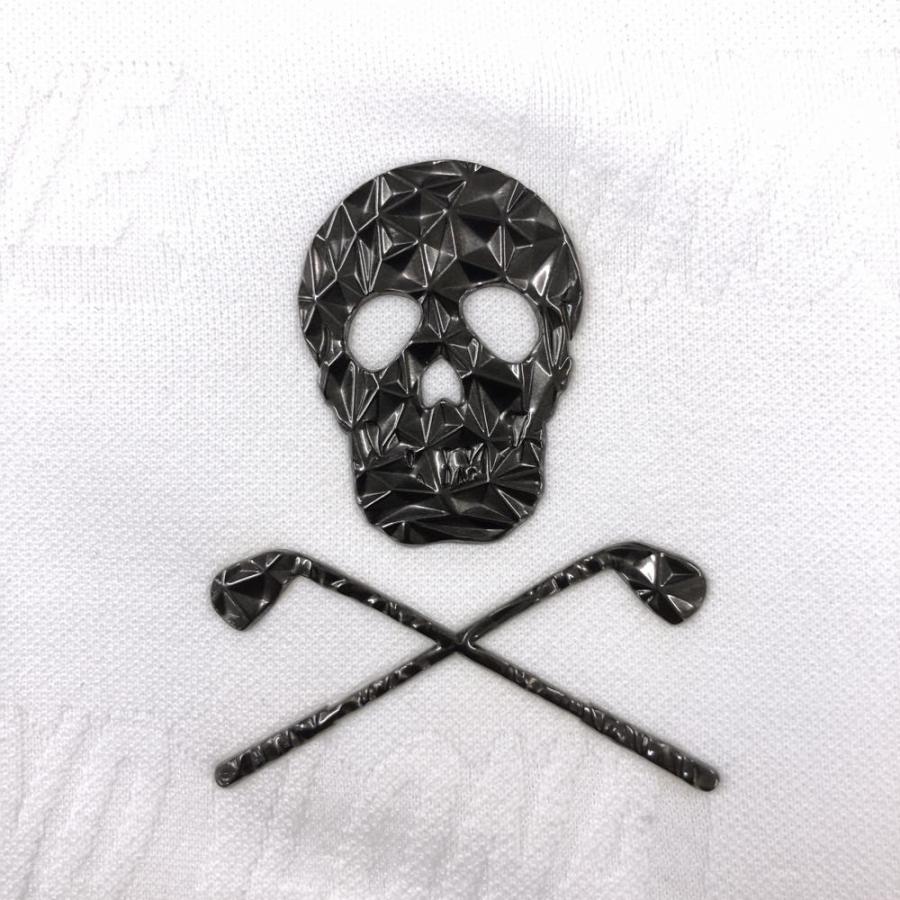 マークアンドロナ 半袖ポロシャツ 白×黒 ロゴ総柄織生地 スカル