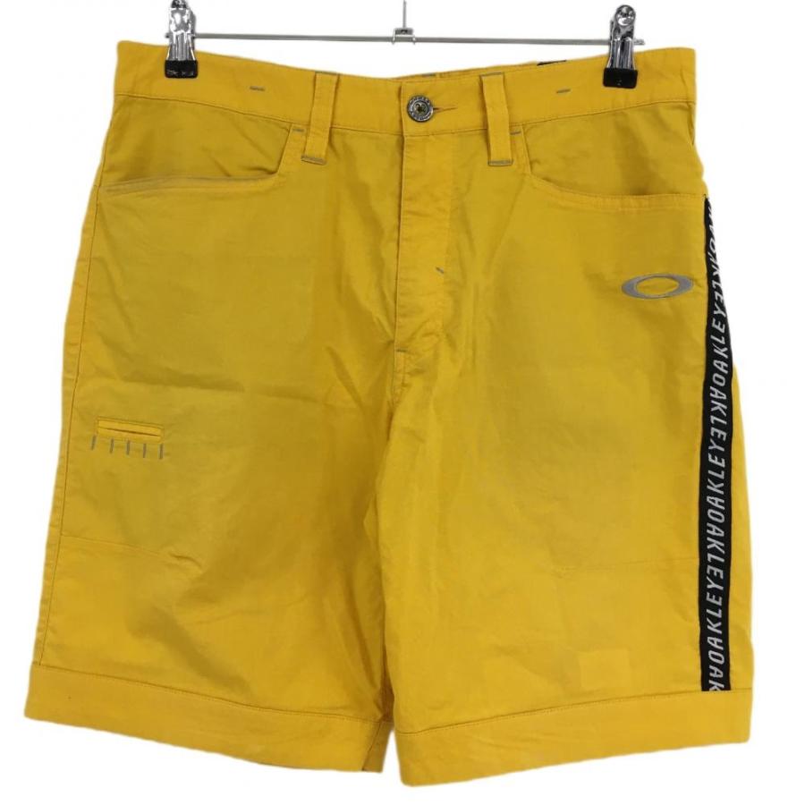 OAKLEY オークリー ハーフパンツ オレンジイエロー サイドロゴ