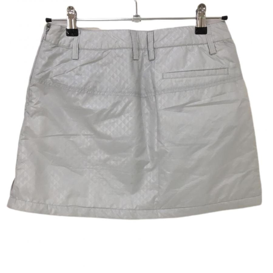 PUMA - 美品 プーマゴルフ ゴルフウェア 中綿スカート 総柄 モノトーン レディース M PUMA プーマ 中綿スカート ライトグレー 地模様 レディース M