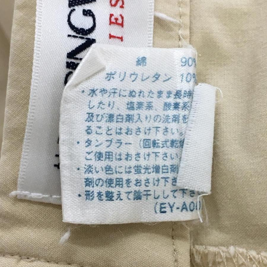 マンシングウェア　ベージュ スラックス ロゴボタン付き Munsingwear（マンシングウェア） パンツ ベージュ バックロゴ刺しゅう