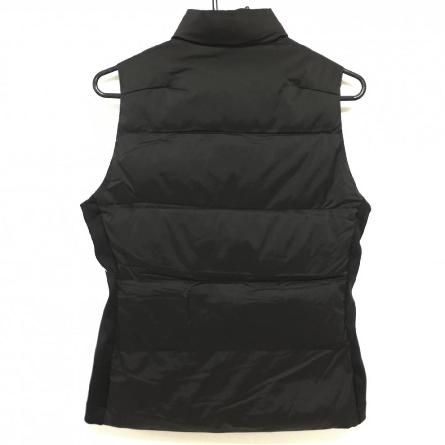 LUXEAKMPLUS 中綿ベストM 新品】リュクスエイケイエムプラス 中綿ベスト 黒 ファスナーロゴ 異