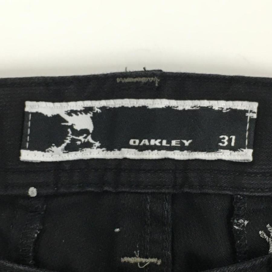OAKLEY（オークリー） パンツ 黒×白 ペイント柄刺しゅう 立体裁断