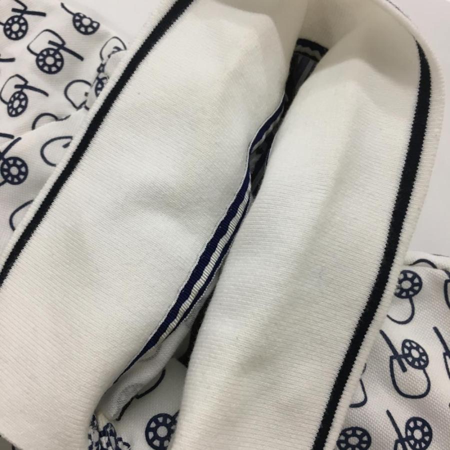 and per se（アンパスィ） 半袖ポロシャツ 白×ネイビー 総柄 ロゴ
