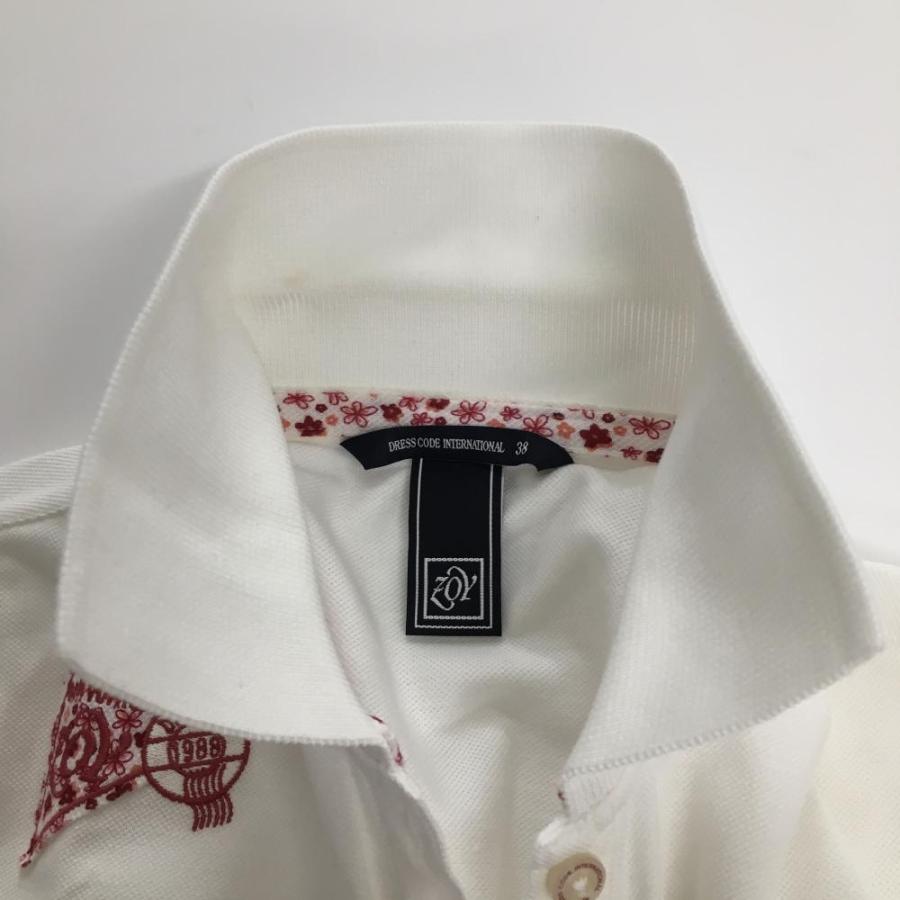 ZOY レディースポロシャツ 38 新品 ZOY（ゾーイ） 半袖ポロシャツ 白×レッド 前身頃複数ワッペン 襟薄汚れ