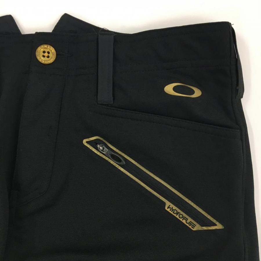 OAKLEY（オークリー） 【新品】オークリー パンツ 黒×ゴールド ティー