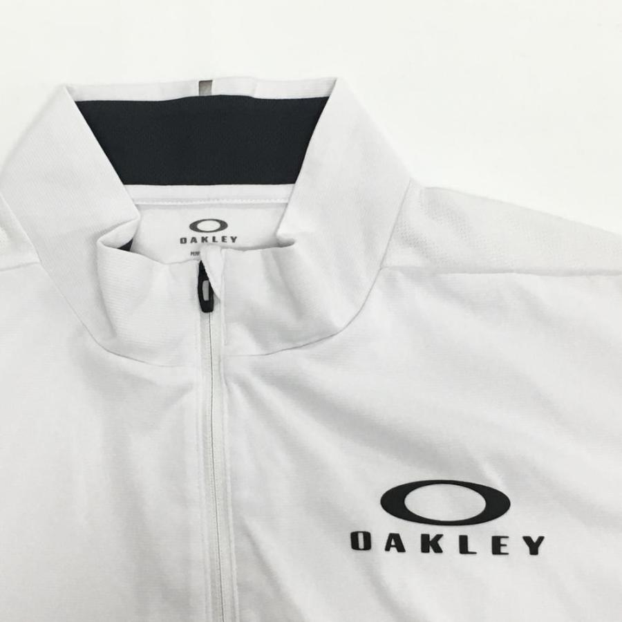 OAKLEY（オークリー） 半袖ポロシャツ 白 ロゴ黒 ハーフジップ 袖下