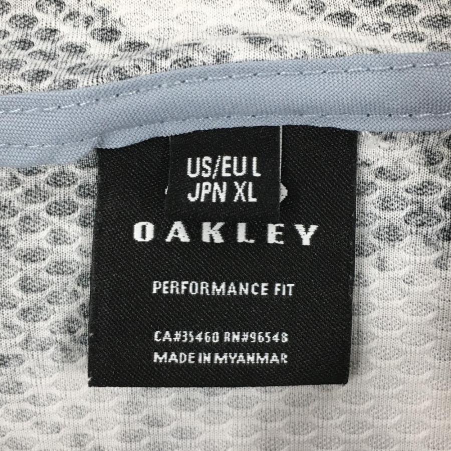 OAKLEY（オークリー） 【美品】オークリー ジップパーカー 白×黒 総柄