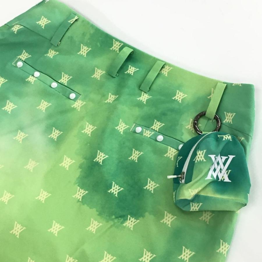 超美品】アニューゴルフ スカート ライトグリーン×イエロー ロゴ総柄