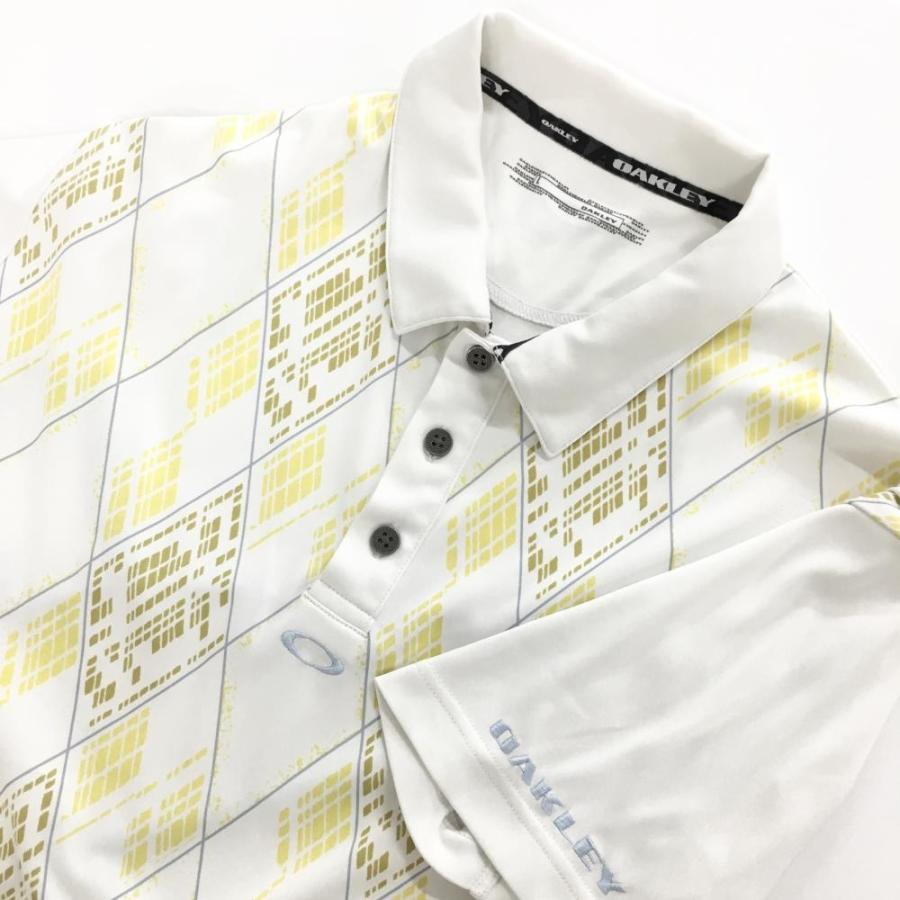OAKLEY（オークリー） 【美品】オークリー 半袖ポロシャツ 白×イエロー