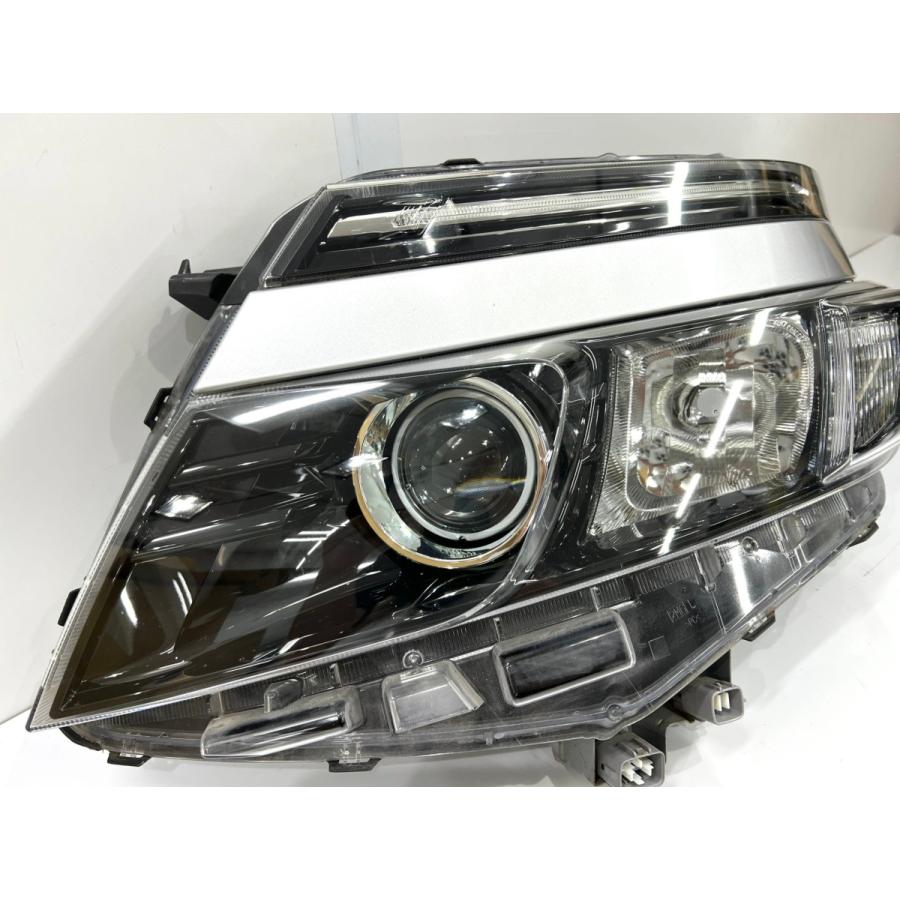 ヴォクシー ZRR80 前期 純正ヘッドライト 左 ICHIKOH28-230 刻印M