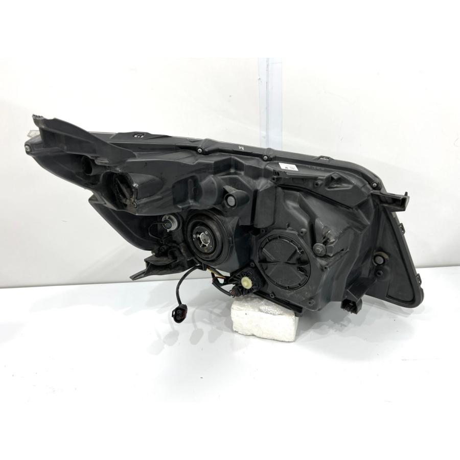 ヴォクシー ZRR80 前期 純正ヘッドライト 左 ICHIKOH28-230 刻印M