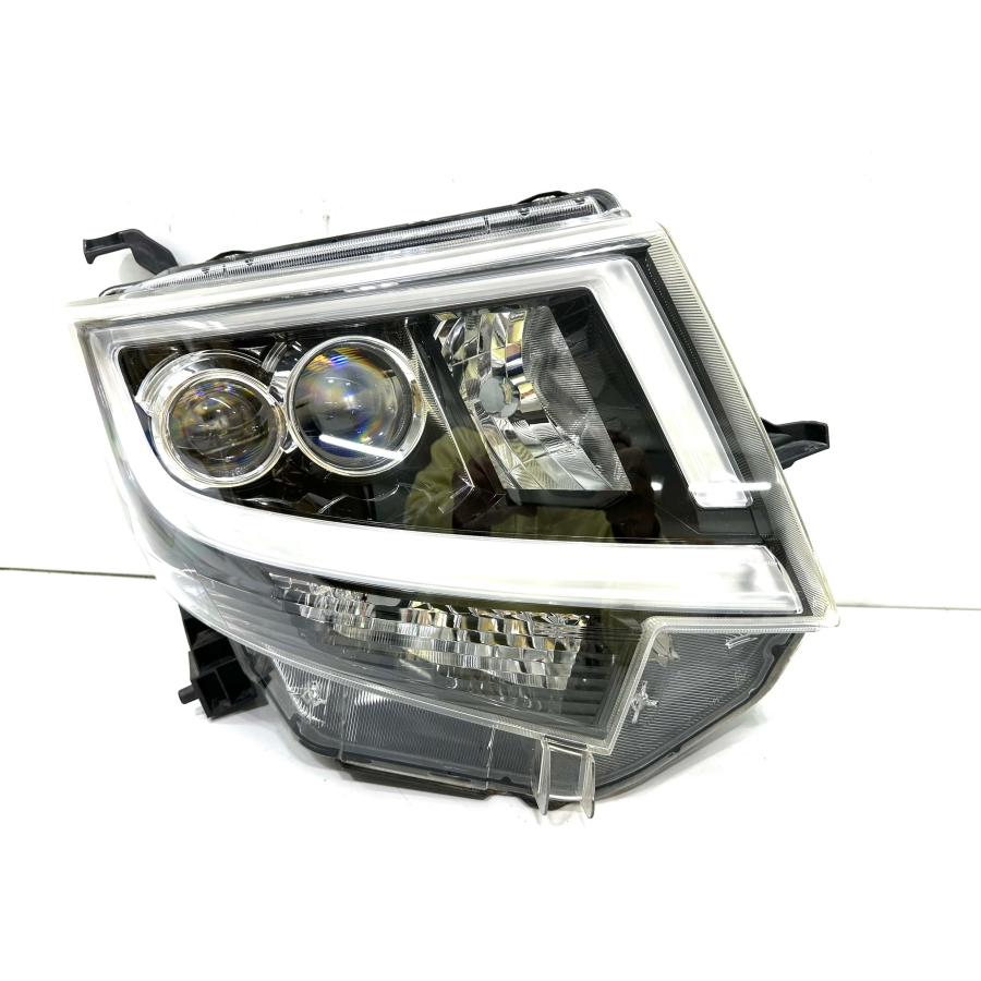 ダイハツ ムーブカスタム ヘッドライト右