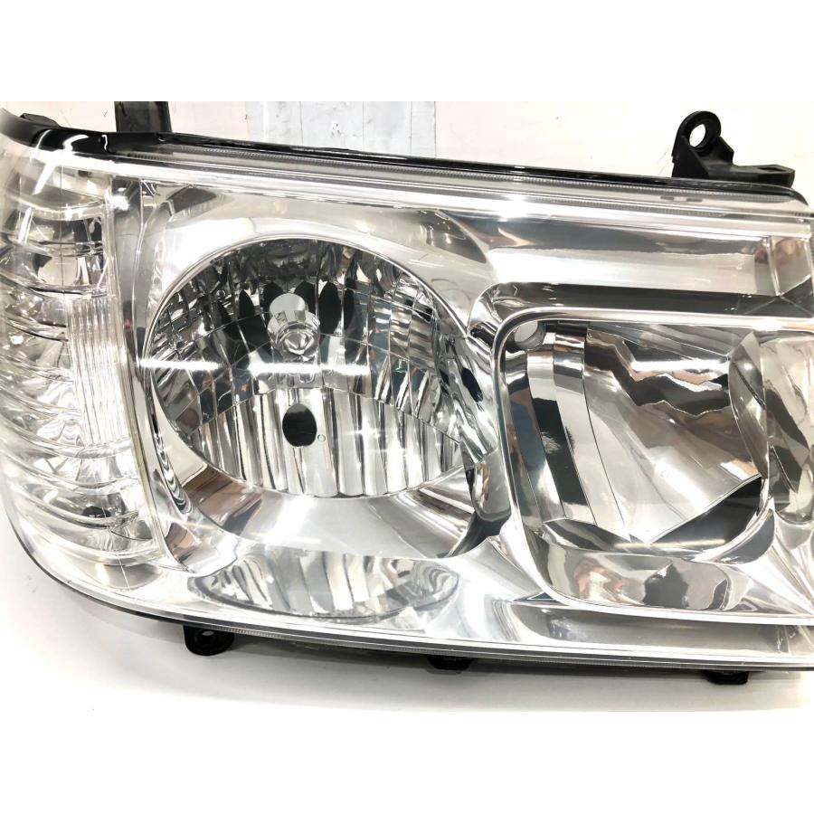 新品ランドクルーザー100系純正ヘッドライト右側