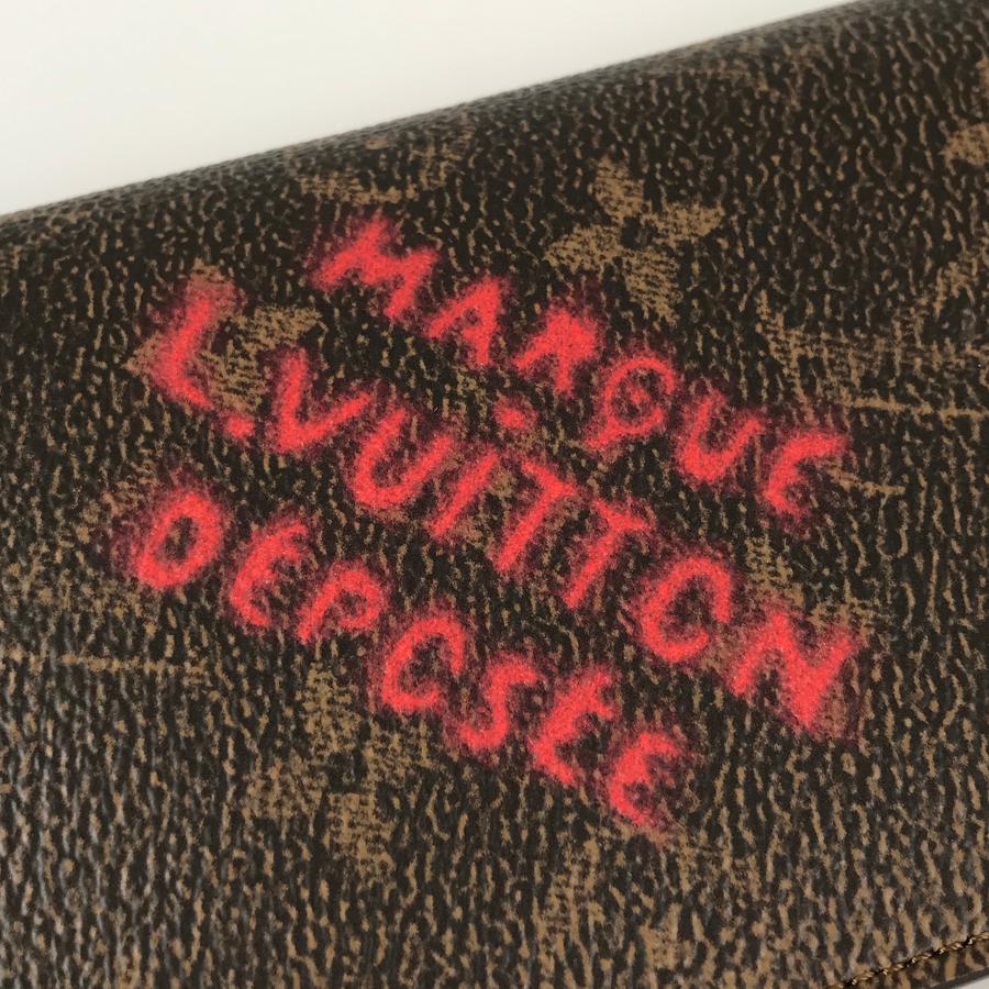 LOUIS VUITTON（ルイ・ヴィトン） モノグラム ダスト ポルトフォイユ