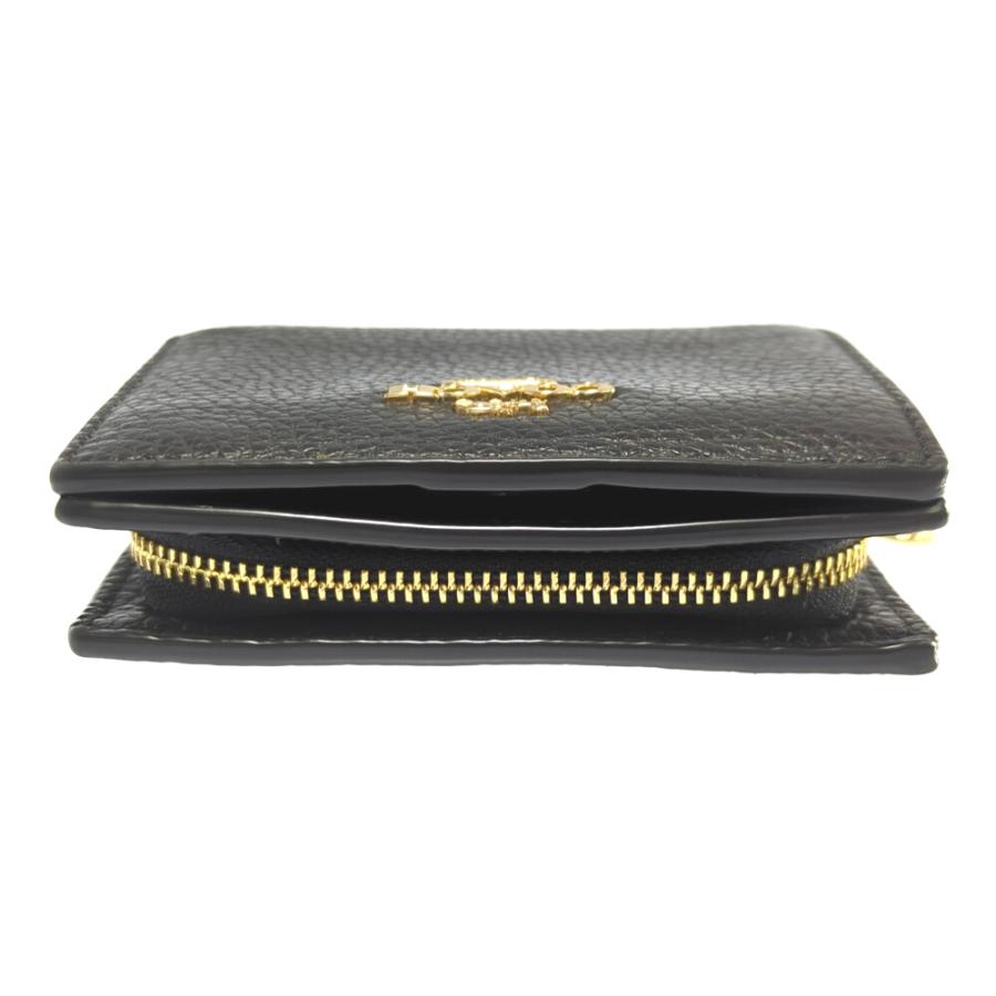 COACH（コーチ） (ラスト1点) ロゴプレート レザー 2つ折り財布