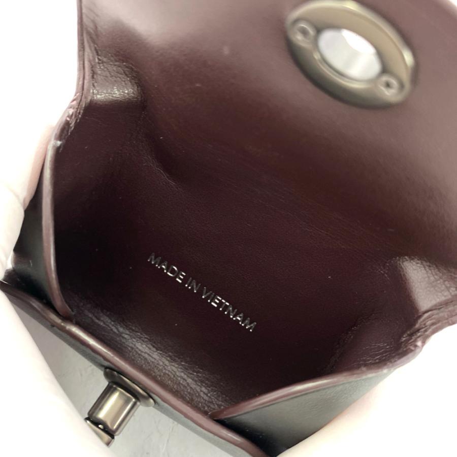 COACH（コーチ） ターンロック ピンズ ティーローズ レザーカード