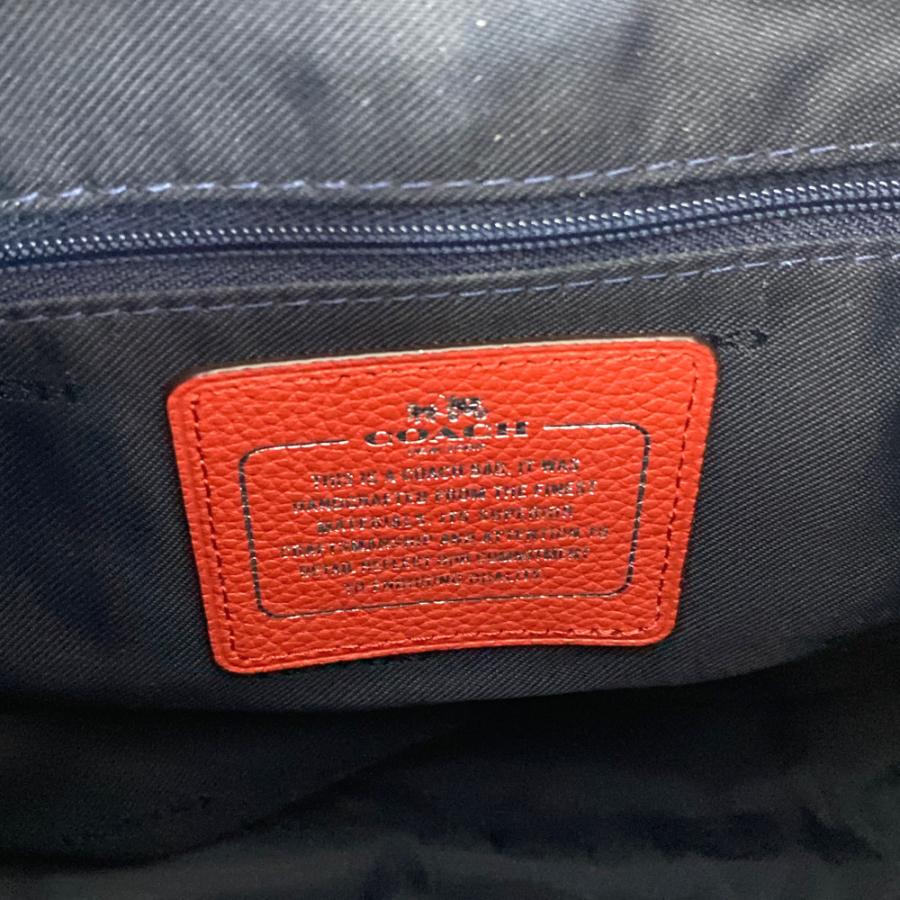 COACH（コーチ） ミニターンロックフローラルプリントレザーリュック