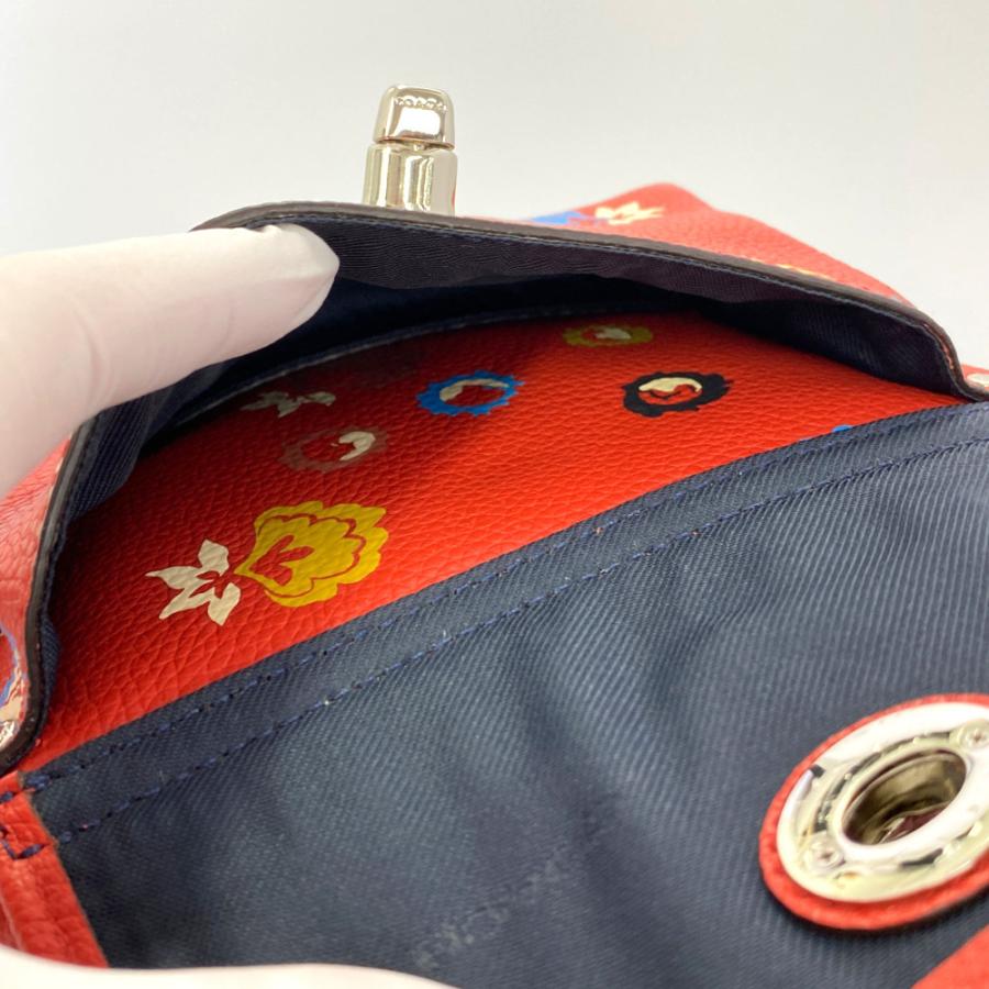COACH（コーチ） ミニターンロックフローラルプリントレザーリュック
