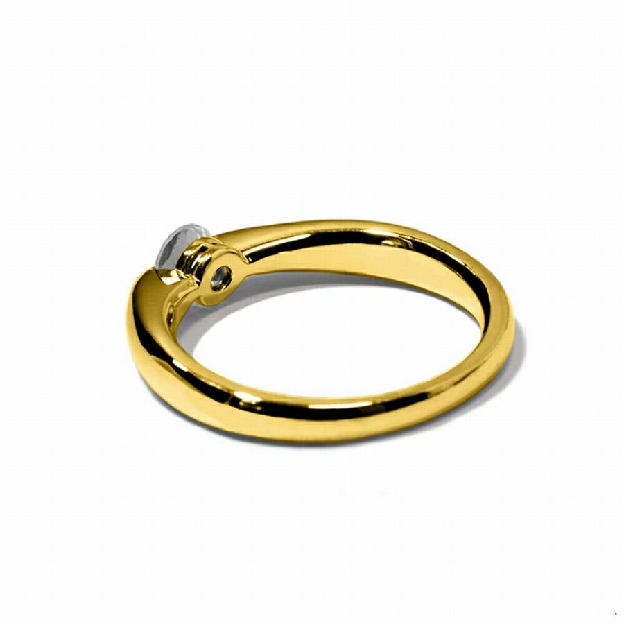 指輪 18金 イエローゴールド 天然石 一粒リング 主石の直径約4.4mm ソリティア しぼり腕 二本爪留めの画像