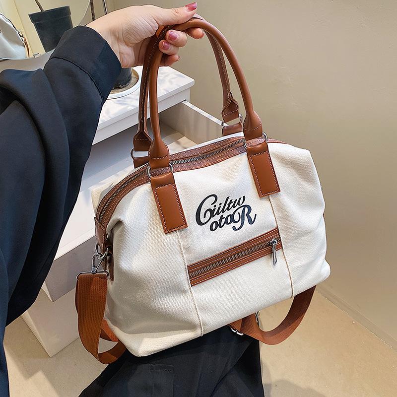 ショルダーバッグ レディース 鋲付き トートバッグ 2WAY キャンパスバッグ 大容量 カジュアル ストリート ユニセックス | ホームアイホーム