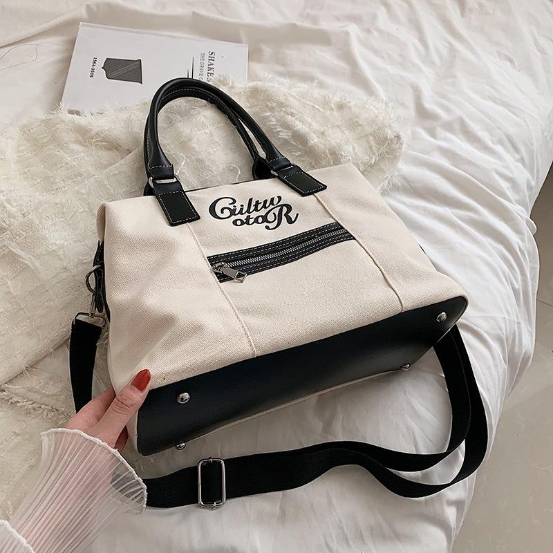 ショルダーバッグ レディース 鋲付き トートバッグ 2WAY キャンパスバッグ 大容量 カジュアル ストリート ユニセックス | ホームアイホーム | 02