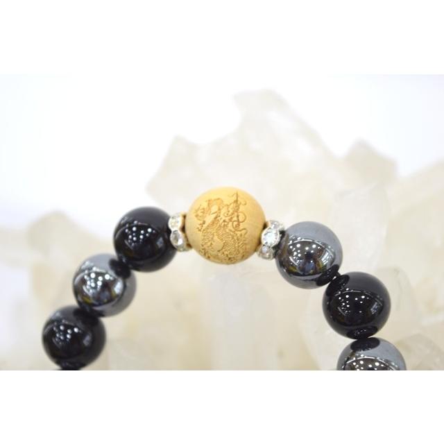 厄除け 開運 オニキス ヘマタイト 木彫り剣龍 パワーストーンブレスレット 12mm |  | 01