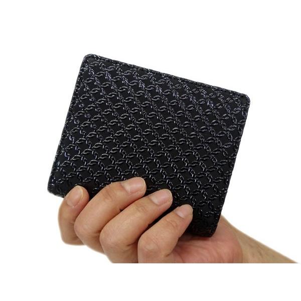 印傳屋 印伝 財布 二つ折り札入 2217 黒地鹿革 黒漆 七宝繋ぎ柄 印傳屋 印伝 財布 二つ折り札入 2217 黒地鹿革 黒漆 七宝繋ぎ柄