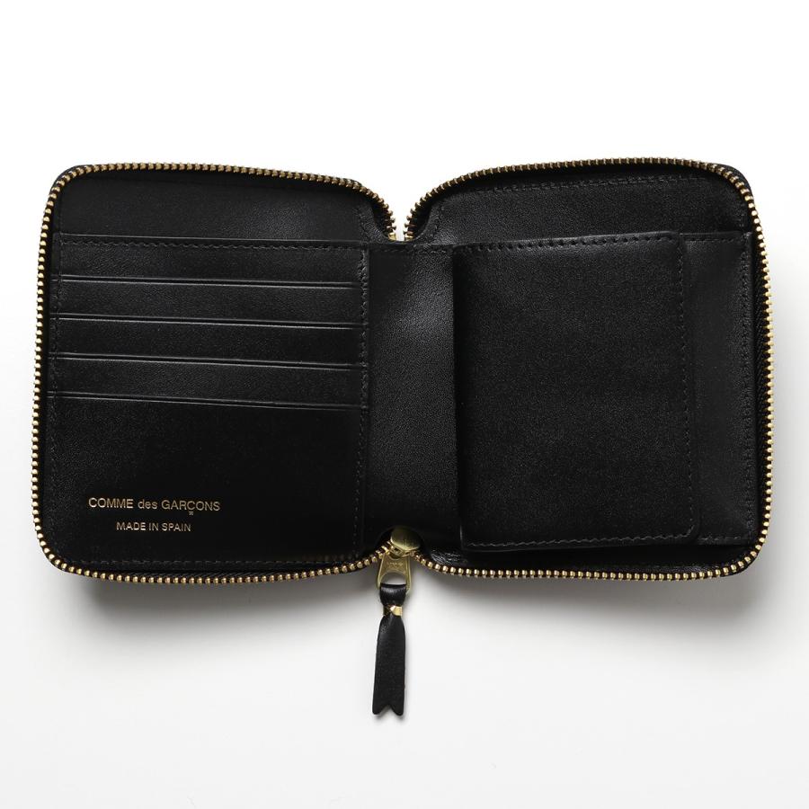 COMME des GARCONS コムデギャルソン 二つ折り財布 EMBOSSED COMME des GARCONS コムデギャルソン 二つ折り財布 EMBOSSED