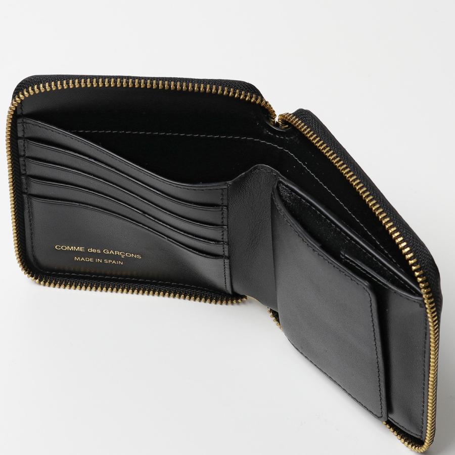 COMME des GARCONS コムデギャルソン 二つ折り財布 EMBOSSED COMME des GARCONS コムデギャルソン 二つ折り財布 EMBOSSED